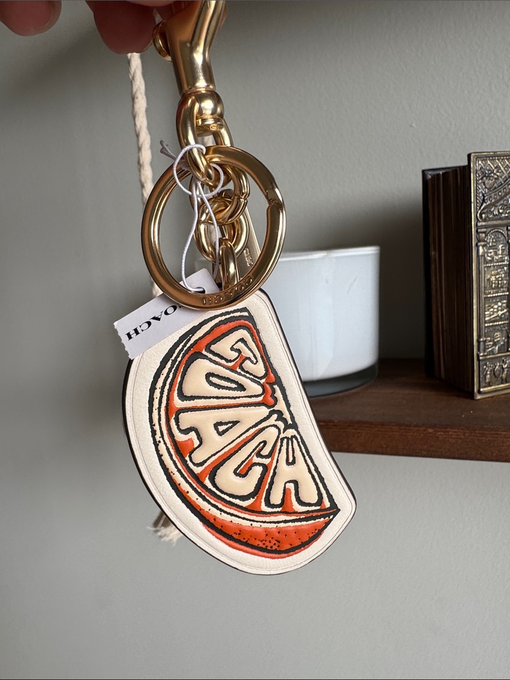 Coach Orange Slice Keychain with Gold Hardware